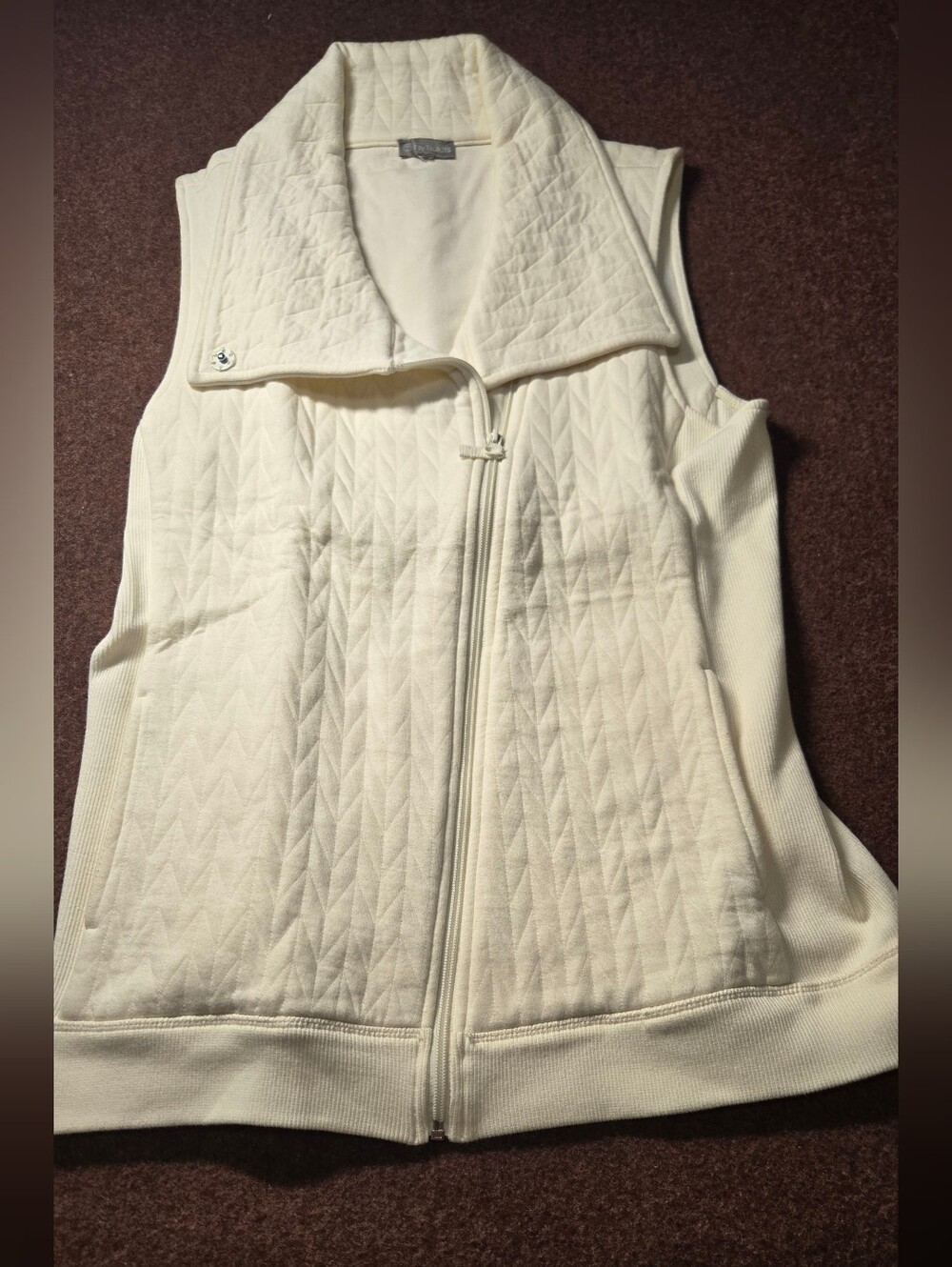 Cream-colored T by Talbots Quilted Zip-Up Vest Measuring At A Medium